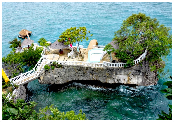 Buho Rock Resort is a unique place known for its ship-like rock docking by a cliff. It is where you can see the blue ocean from the viewing deck of this rock.